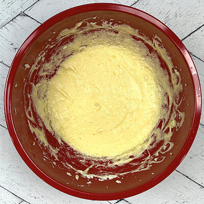 Step 4 - Mix butter, sugar, lemon zest and salt until you have a light and fluffy mixture. Add the eggs, one by one, and mix until well blended.
