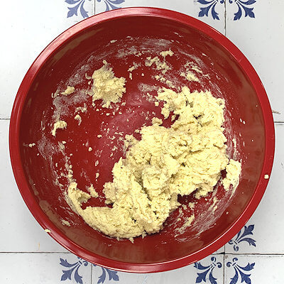 Step 1 - Add butter and sugar to a bowl and mix until fluffy. Add flour, salt and milk and mix again until the dough comes together.