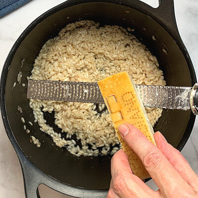 Step 6 - Finish your risotto by adding butter, cheese, and season with salt & pepper.