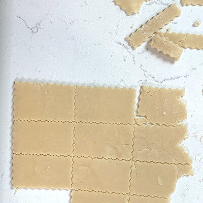 Step 4 - On a lightly floured surface, roll the dough to 1/8-inch thickness and cut cookies of 2.5x1.5 inches.