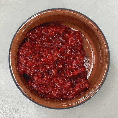Step 6 - Cut and smash the raspberries and keep cool until needed.