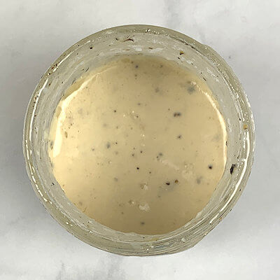 Step 1 - Make the dressing by mixing mayonnaise, garlic, Worcestershire sauce, Dijon mustard, lemon juice, olive oil, salt & pepper. Keep in the fridge until needed.