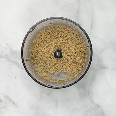 Step 2 - Grind the walnuts fine. Do this with a food processor, a knife or with a rolling pin.