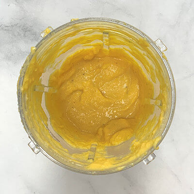 Step 3 - Transfer butternut squash cubes and ricotta to a food processor. Puree until smooth. 