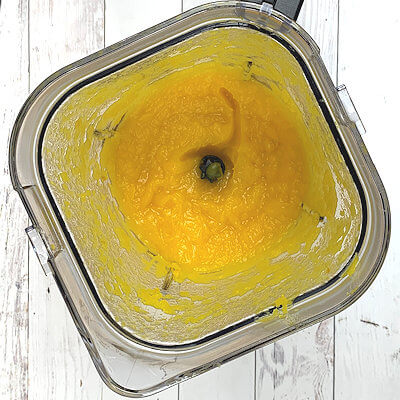 Step 6 - Scoop the flesh out of the pumpkin halves, straight into a food processor. Process the pumpkin flesh for a few minutes and your beautiful, vibrant pumpkin puree is ready to be used.