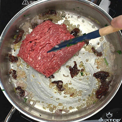 Step 4 - Add ground beef and cook on medium-high heat and use a spatula or spoon to break it up into larger pieces. 