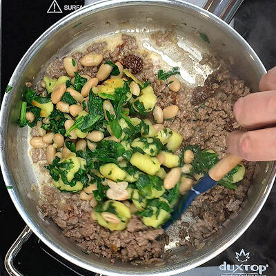 Step 6 - Add white gnocchi mixture back into the pan and stir. Add lemon juice, taste and add salt & pepper if necessary. 