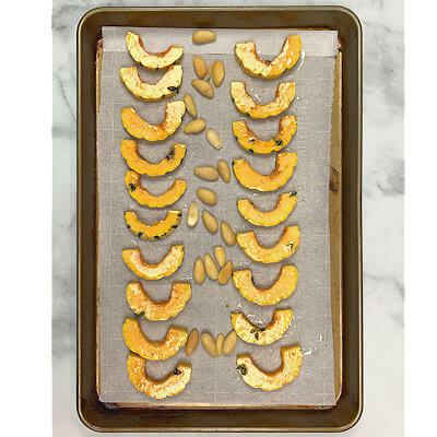 Step 2 - Place squash rings on baking sheet. Coat with olive oil mix and bake for about 30 minutes in oven
