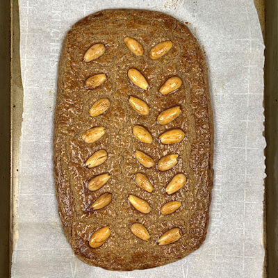 Step 4 - Speculaas is done when a toothpick comes out clean and the almonds turned light brown. 