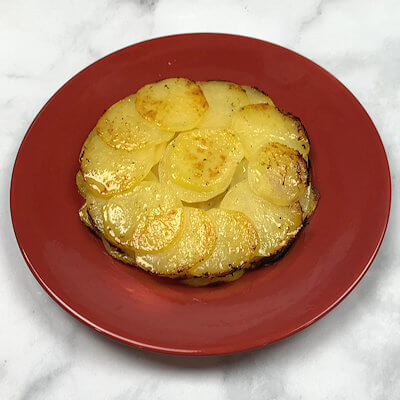 Step 7 - Place a plate on top of the pie dish and turn galette onto that plate. If you want the top to be more caramelized, broil the galette until it reaches the color and crispiness you like (make sure you use a broiler-safe plate).