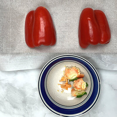 Step 1 - Wash and cut the pepper(s) in half and remove seeds and white veins. Cutting the peppers in half is not a must, but if you leave them whole, you will need to rotate them during the roasting and that may increase their roasting time.