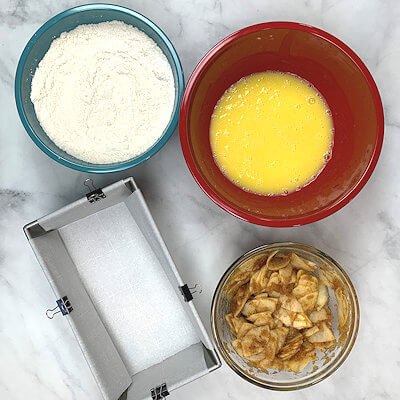 Step 1 - Make 3 mixes and line your cake from with parchment paper.
1. Dry ingredients, 2. wet ingredients, 3. apple mixture