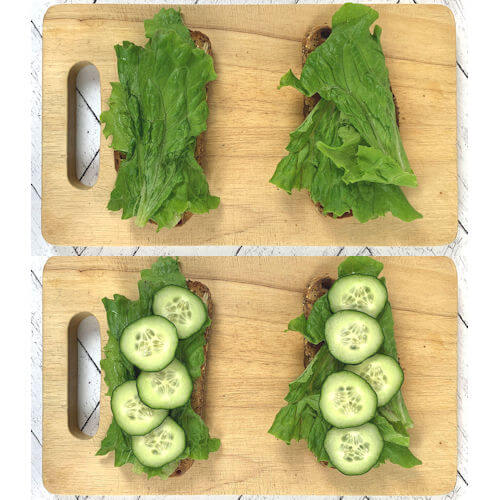 2 wooden planks, each with 2 slices of toast. One with just lettuce the other one with lettuce and cucumber slices.