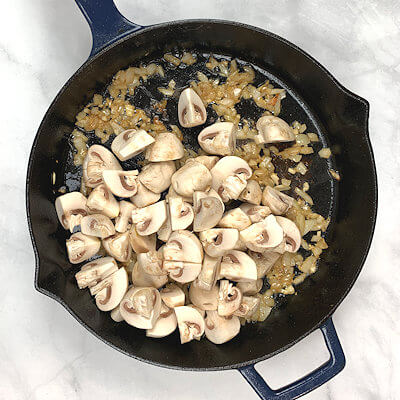 Step 4 - Add mushrooms to skillet and cook until mushroom become golden brown. 
