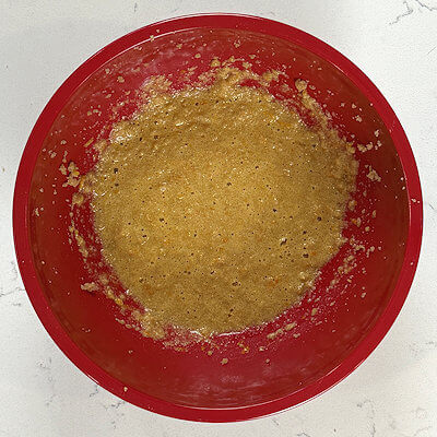 Step 2 - Add orange zest, orange juice and an egg and mix until combined.