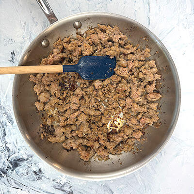 Step 3 - Saute the chicken sausages in a skillet, breaking up the meat, until brown. Cook pasta according to the directions on the packaging.