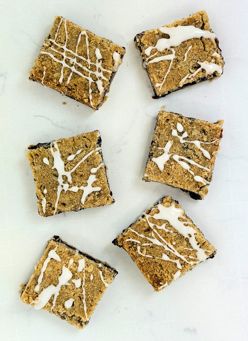 An option is to drizzle a powdered sugar glaze over the top of the bars.