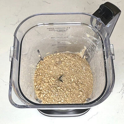 Step 1 - Place flour, rolled oats, light brown sugar, butter and vanilla extract in a food processor. Pulse a few times until the mixture resembles a coarse meal.