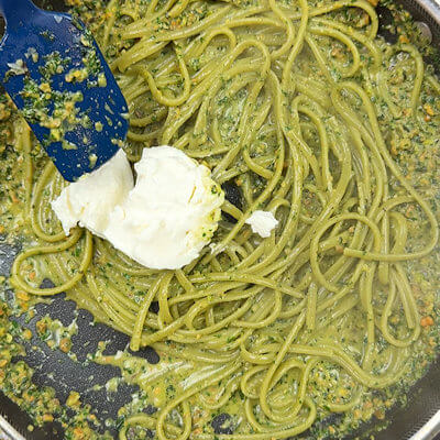 Step 5 - Add ricotta and mix with the pasta. Add pasta water until you reach a thickness of the sauce to your liking.