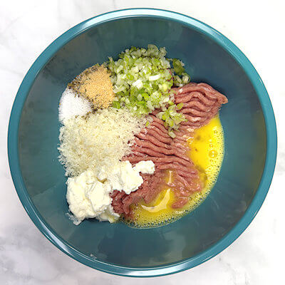 Step 1 - In a mixing bowl, combine all ingredients. Be careful not to over-mix. You'll end up with a stick mixture.