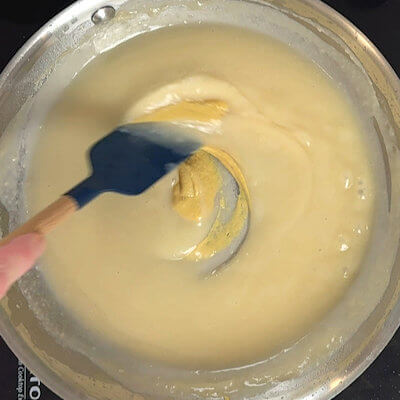 Step 3 - Add the mustard to the sauce, as well as sauce and pepper. Depending on the strength and flavor of the chicken broth you may need to add other spices.