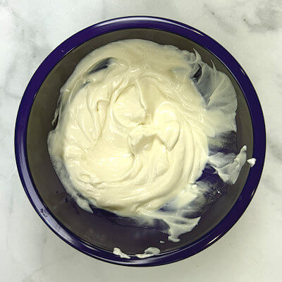 Step 1 - Mix yogurt with maple syrup.