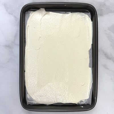 Step 2 - Spread yogurt mixture evenly onto a baking sheet lined with parchment paper.