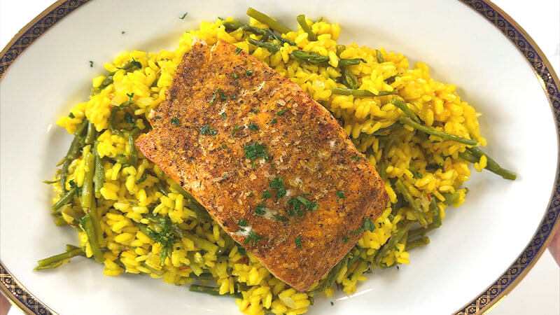 Serve the entire salmon on top of the saffron risotto.
