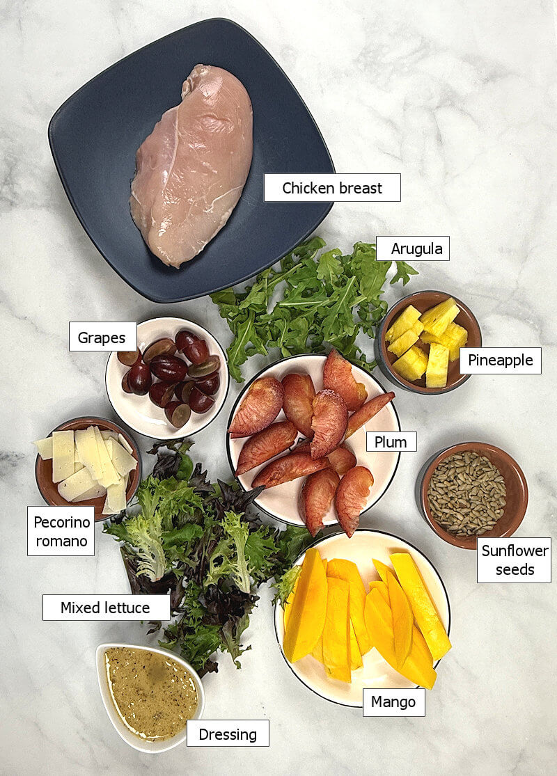 Key ingredients to make a grilled chicken and summer fruit salad