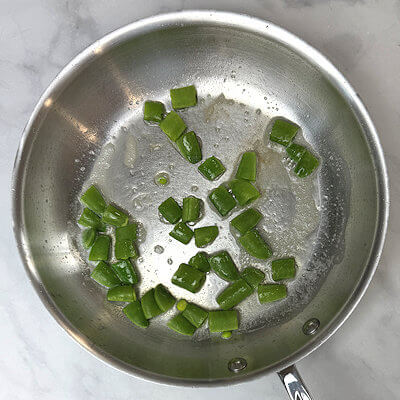 Step 1 - Melt butter in a skillet and add the snap peas. Saute for a few minutes.