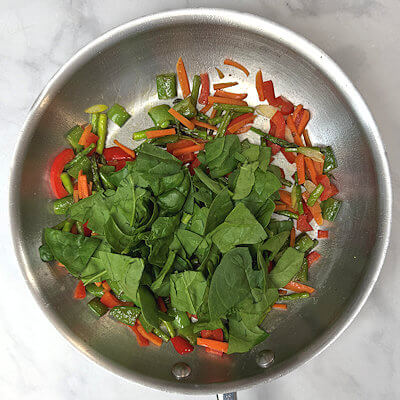 Step 4 - Add the spinach and take the pan from the heat.