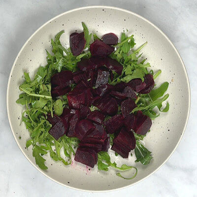 Step 4 - Next layer is the beets. Decide how to cut them, in quarters, in slices, or grate them.