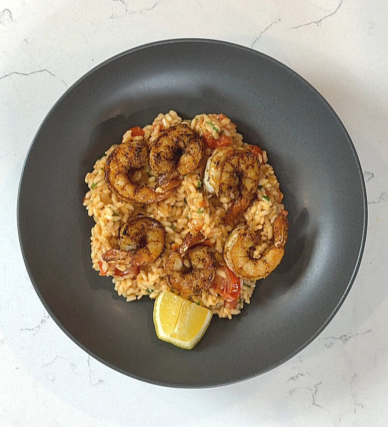 Tomato & Shrimp Risotto on grey plate