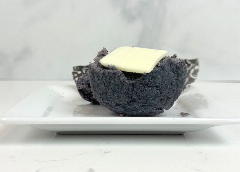 Half a muffin with butter.