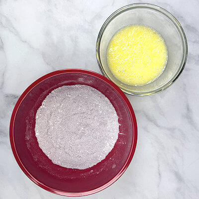 Step 1 - In separate bowls mix dry ingredients (blue cornmeal, cake flour, granulated sugar, baking powder and salt) and wet ingredients (milk, egg, melted butter).