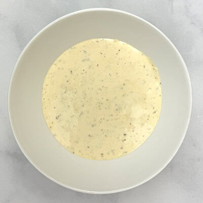 Step 3 - Make the dressing by combining all the ingredients in a bowl and whisk until creamy and smooth. Season to taste with salt & pepper.
