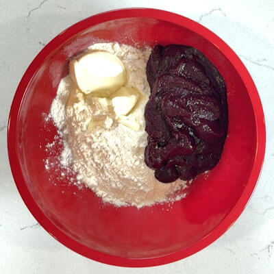 Step 3 - In a bowl, combine all-purpose flour, salt, ricotta and the beet puree and mix and knead it a few minutes until you have a dough. Wrap the dough ball in plastic wrap and store it in the refrigerator for about 30 minutes.