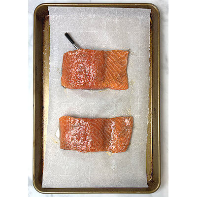 Step 1 - Season the salmon fillets with salt, pepper and garlic powder. Then rub with olive oil.I kept the seasoning basic, as the piccata sauce is the shining star and an overpowering seasoning of the salmon will disrupt the balance.