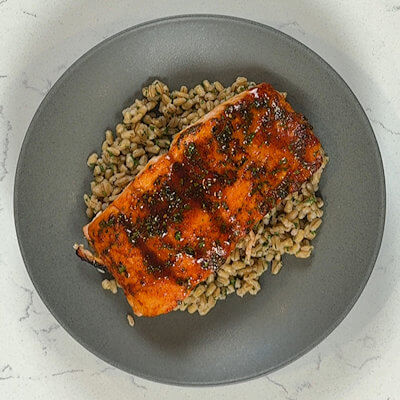 Step 6 - Serve the salmon fillet on a bed of pearl barley