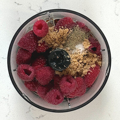 Step 1 - Place all ingredients in a blender; fresh raspberries, olive oil, balsamic vinegar, honey, light brown sugar, salt and pepper.