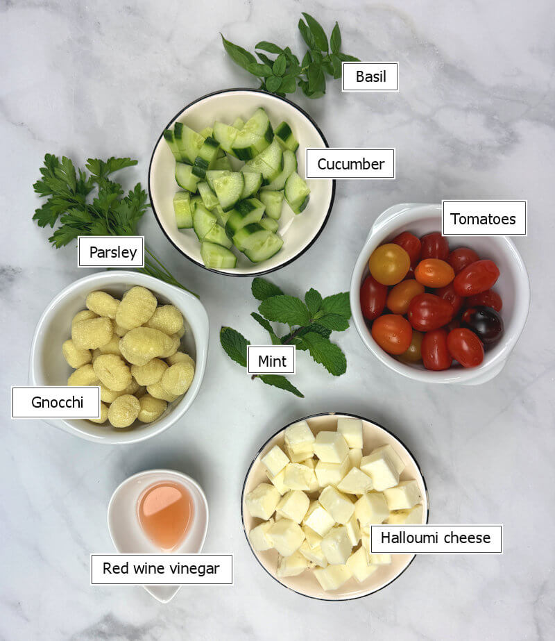 Key ingredients to make Cripsy gnocchi with Halloumi & Tomato
