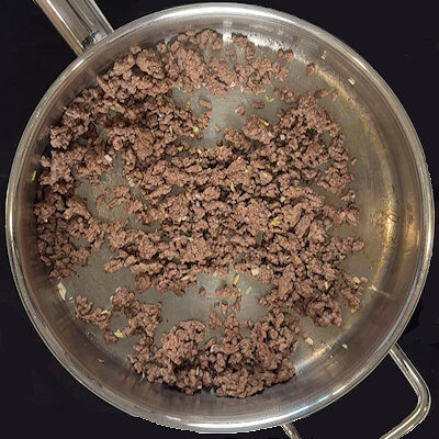 Step 3 - In a skillet brown the ground beef, breaking it up as it cooks. At the end, add the minced fresh ginger and fresh garlic and cook 1-2 minutes.