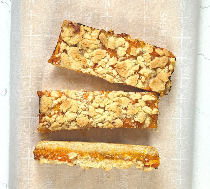 Apricot Crumble Bars cut in 3 long pieces