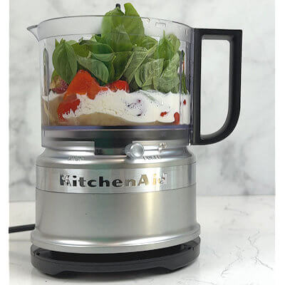 Step 2 - Place all ingredients (roasted red bell peppers, onion, garlic, basil, broth, cream) in a food processor or blender and process until you have a smooth sauce.