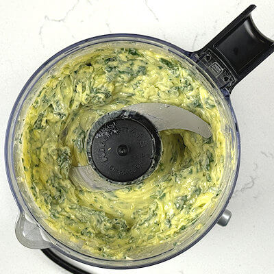 Step 4 - Process until the mixture is well combined. You can strive to chop the basil leaves very fine or stop until you still have larger pieces.