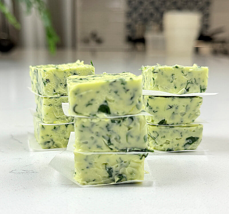 Basil butter with parchment paper to store in freezer or fridge