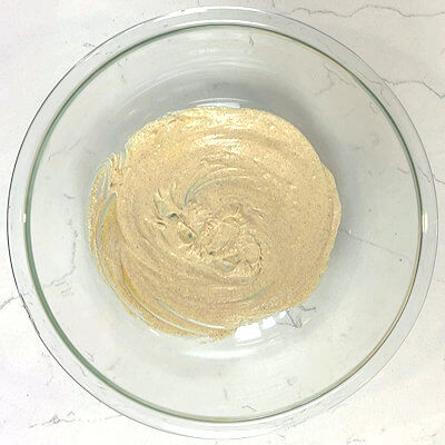 Step 3 - In a large bowl, make the dressing by combining mayonnaise, yogurt, lemon juice, curry powder, ginger powder, cardamon, salt & pepper. If the flavor is too tangy for you, add a little bit of sugar.