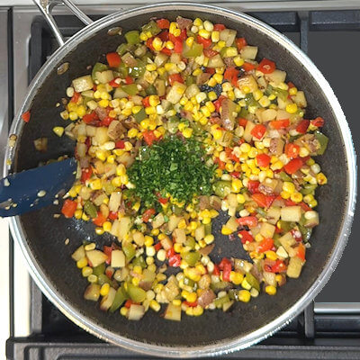 Step 4 - Remove the pan from the heat and add the parsley. Add salt & pepper to taste and a squeeze of lemon juice.